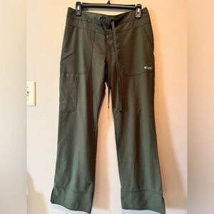 Greys anatomy olive green size S scrubs. Drawstring with elastic at back waist.